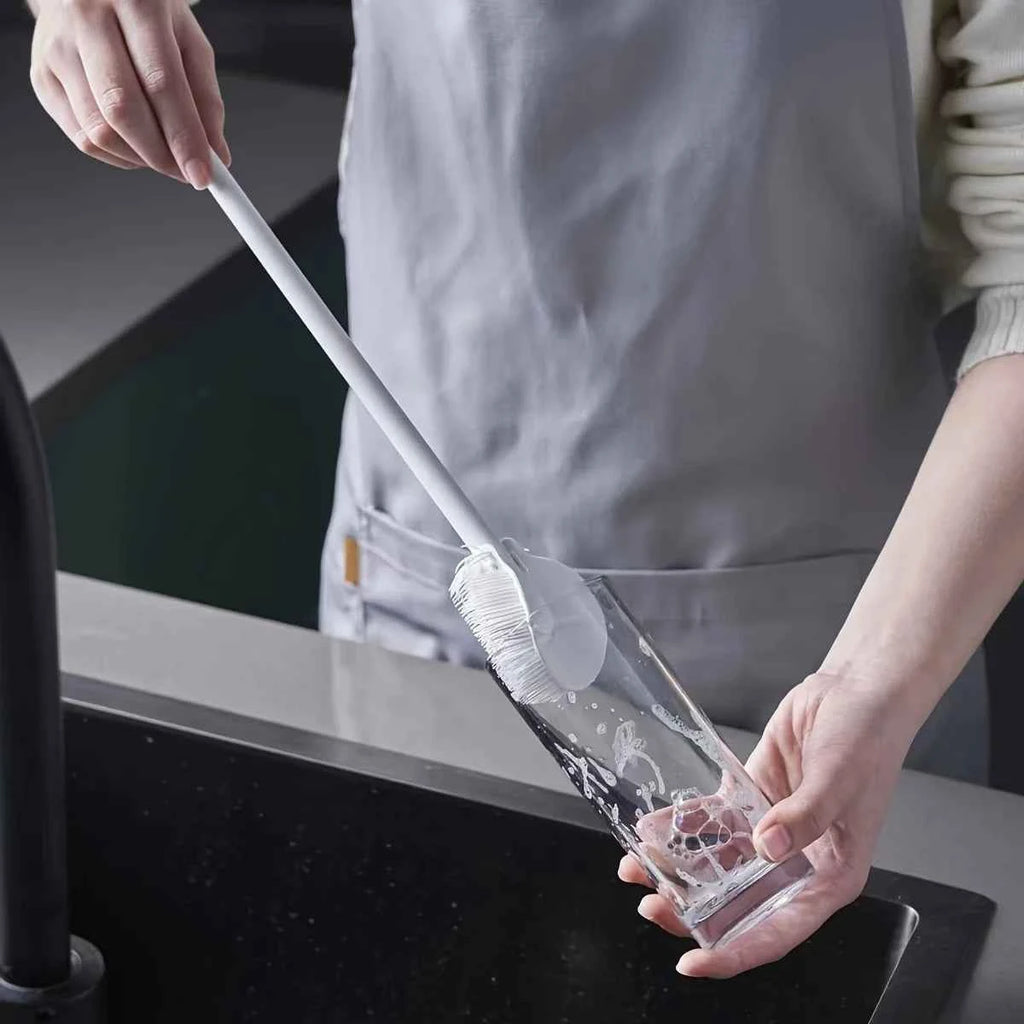 Foldable 360 Degree Silicone Bottle Brush - lifestyle use in small kitchen or home